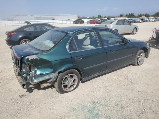 Photo 2 VIN: JHMEJ6679XS002059 - HONDA CIVIC LX 