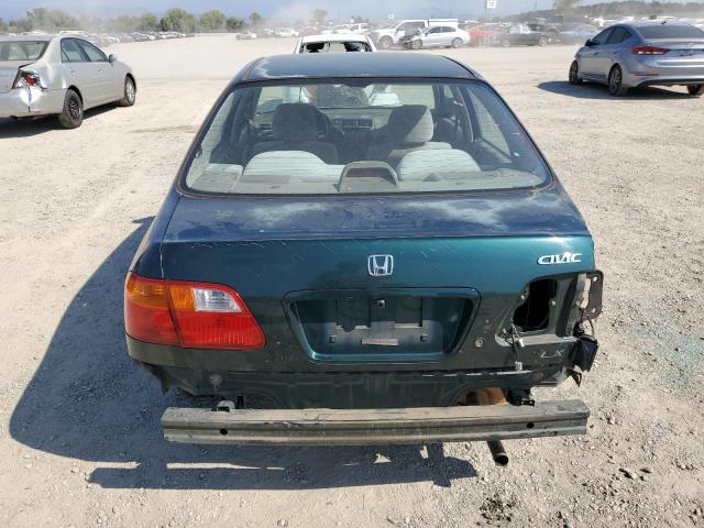 Photo 5 VIN: JHMEJ6679XS002059 - HONDA CIVIC LX 