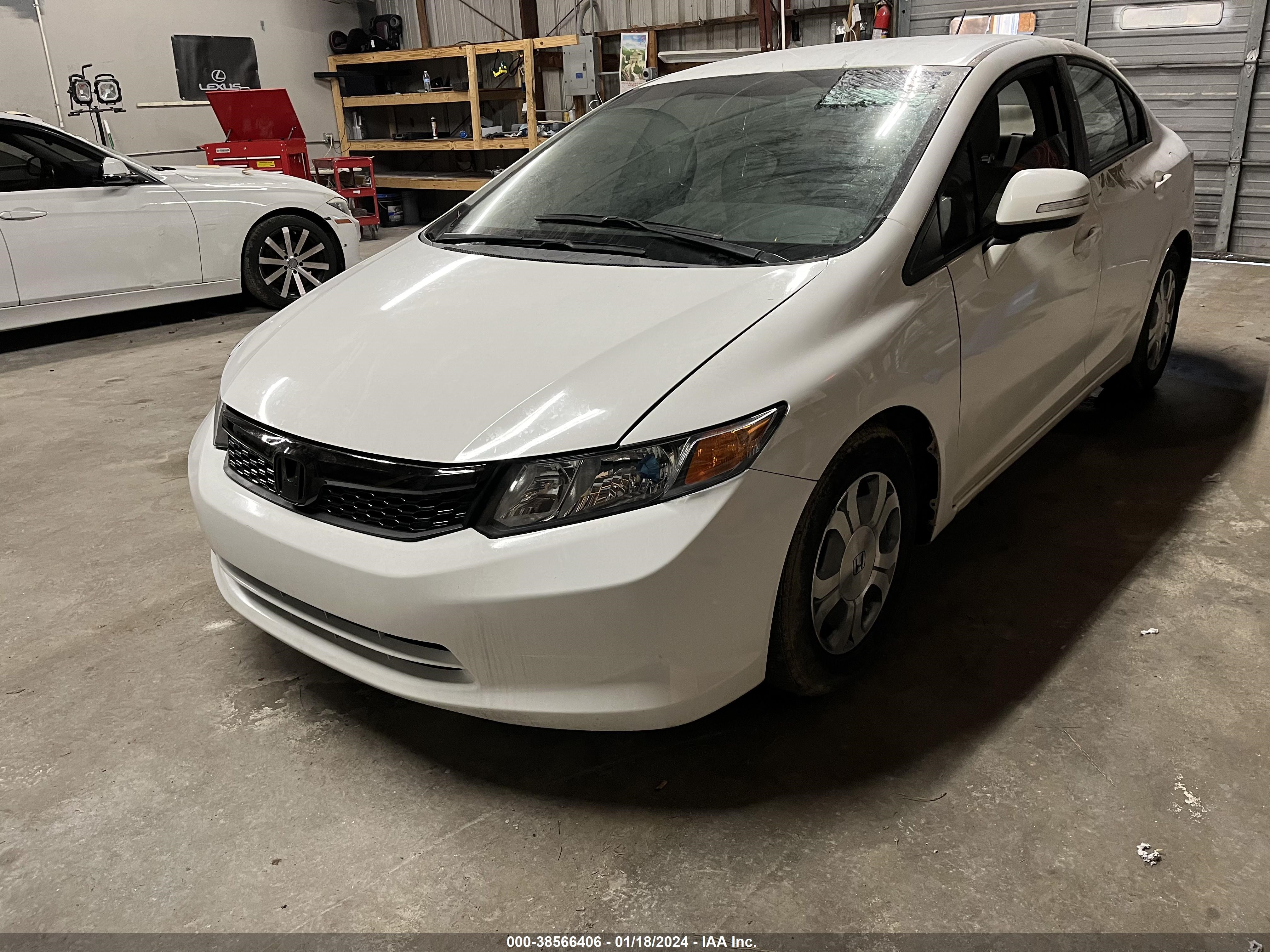 Photo 1 VIN: JHMFB4F21CS011343 - HONDA CIVIC 