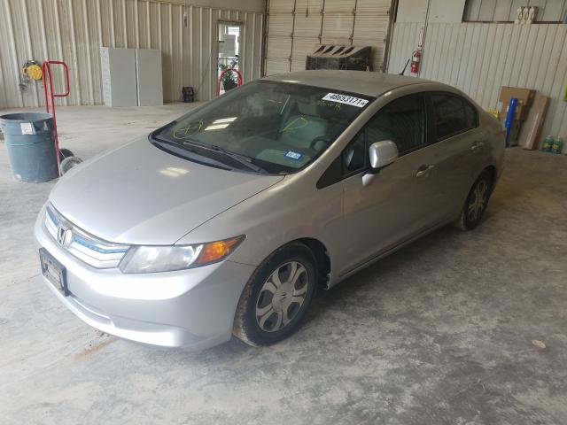 Photo 1 VIN: JHMFB4F23CS007911 - HONDA CIVIC HYBR 