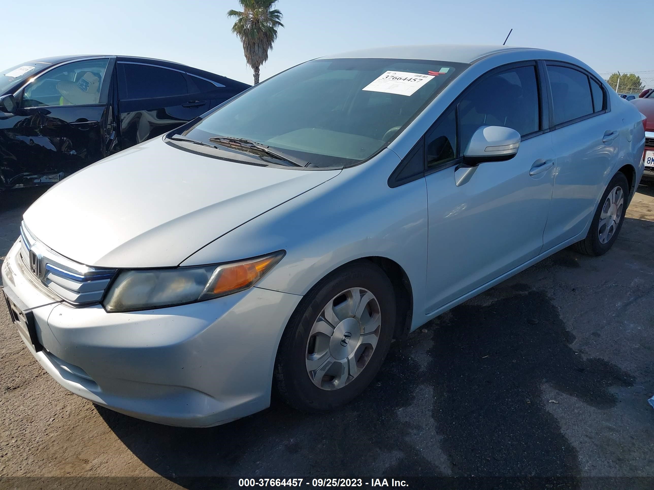 Photo 1 VIN: JHMFB4F27CS006373 - HONDA CIVIC 