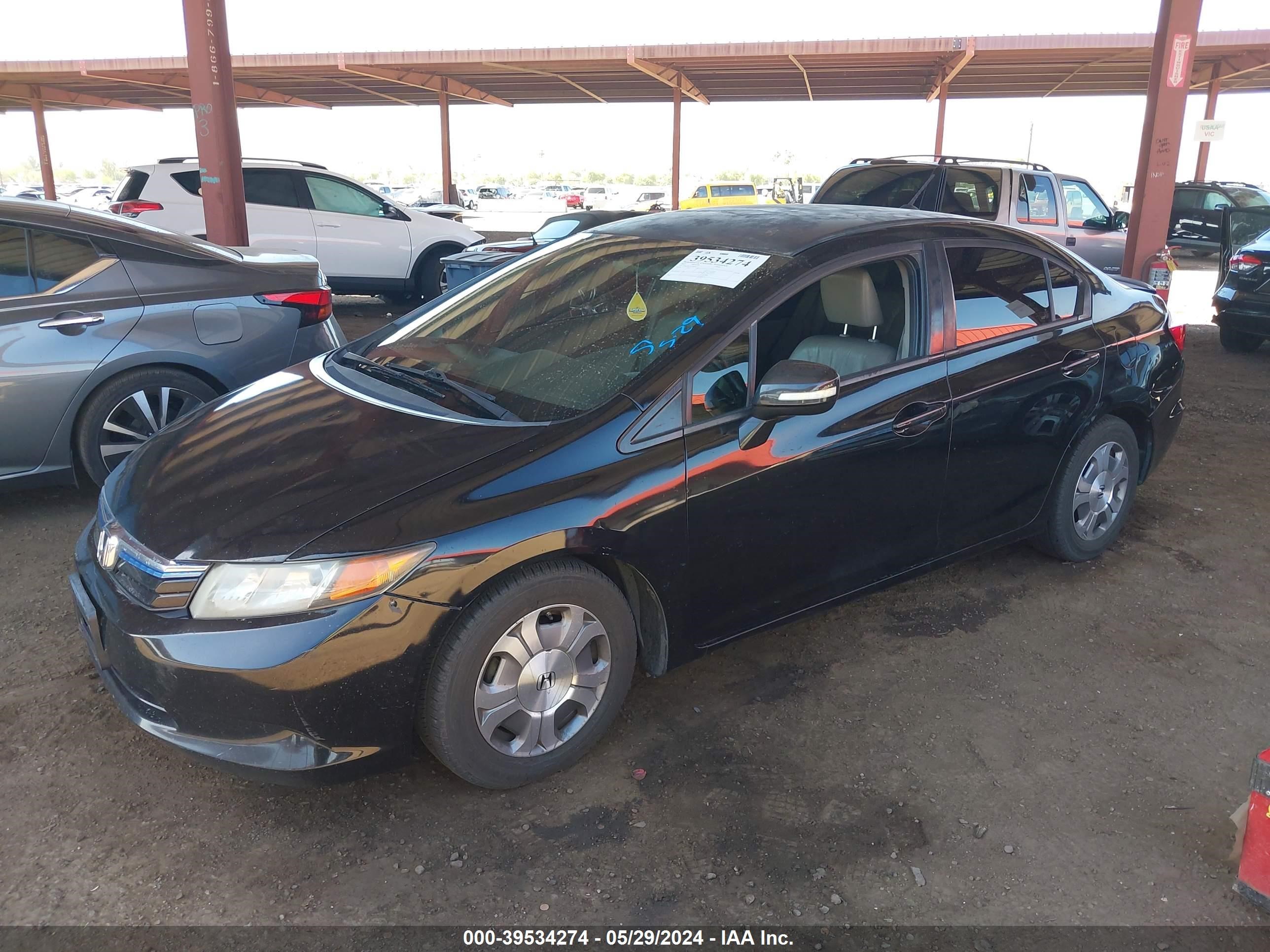 Photo 1 VIN: JHMFB4F31CS008371 - HONDA CIVIC 