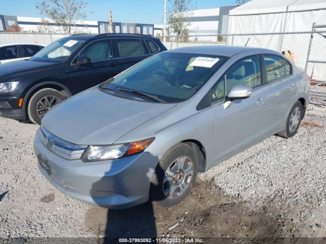 Photo 1 VIN: JHMFB4F34CS002564 - HONDA CIVIC 