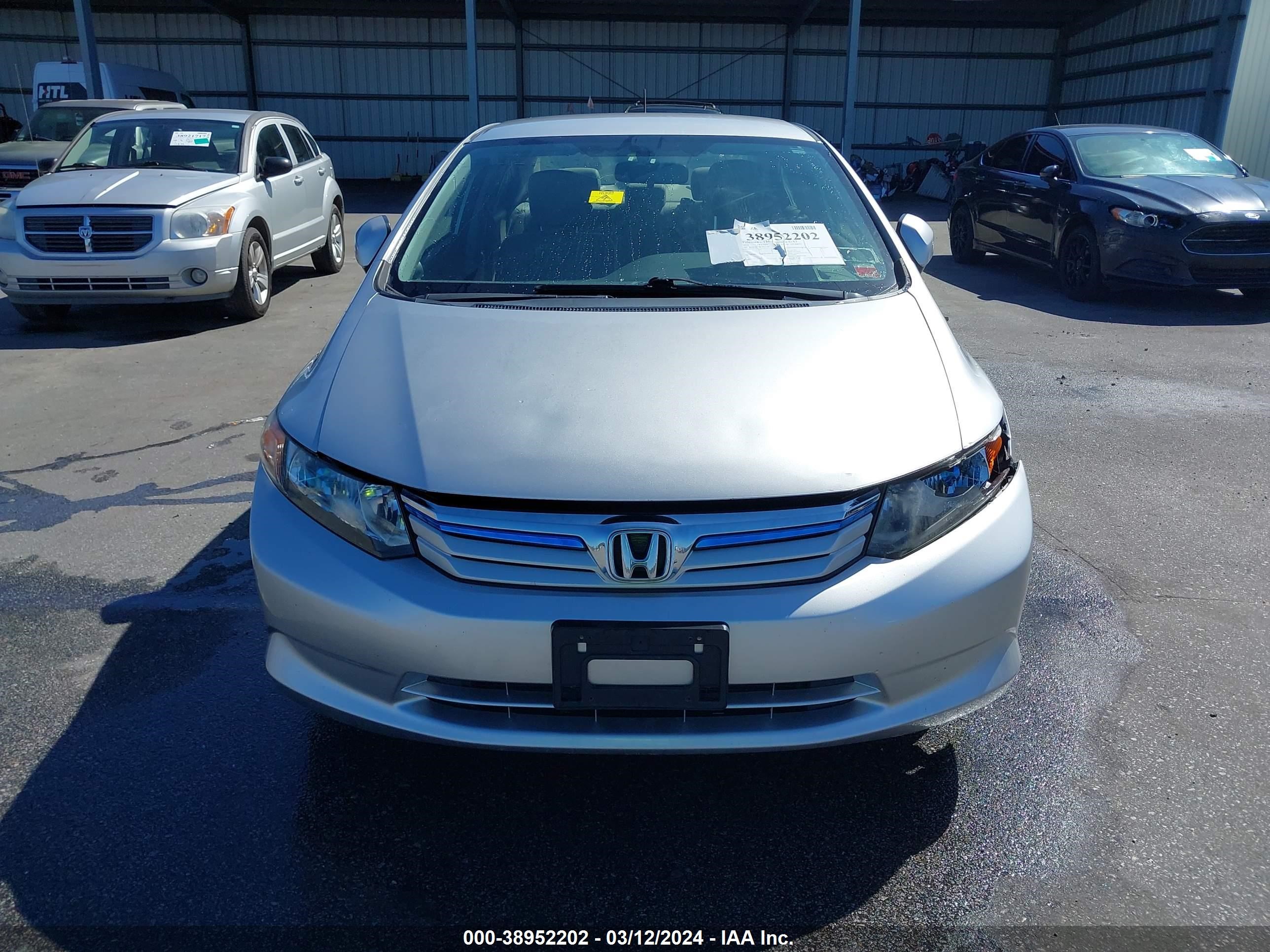 Photo 5 VIN: JHMFB4F38CS011204 - HONDA CIVIC 