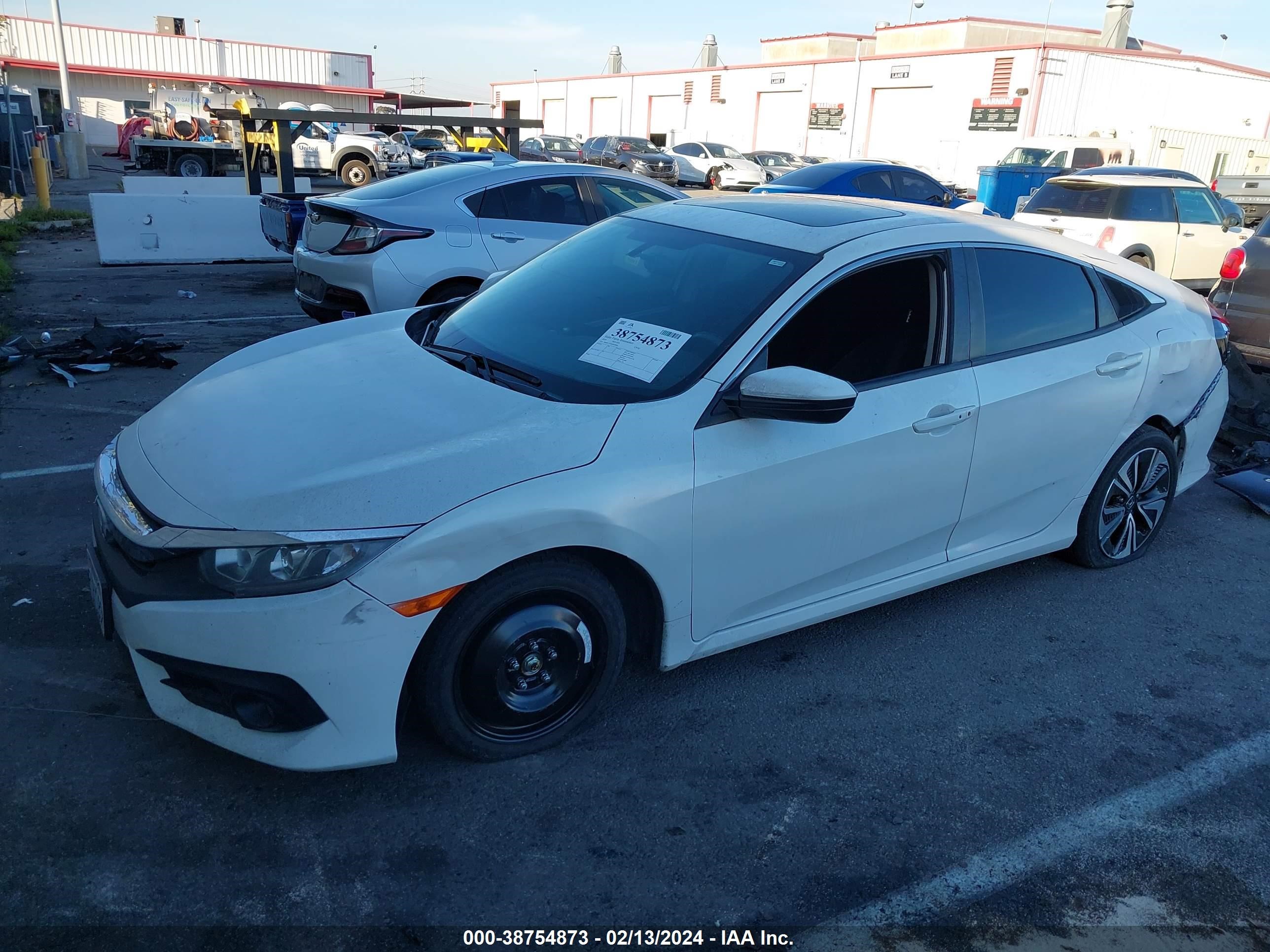 Photo 1 VIN: JHMFC1F34JX038802 - HONDA CIVIC 