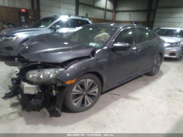 Photo 1 VIN: JHMFC1F36JX020091 - HONDA CIVIC SEDAN 