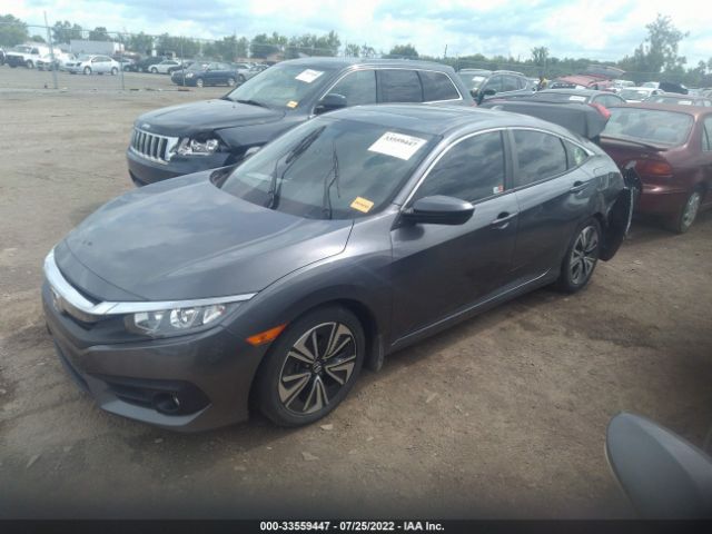 Photo 1 VIN: JHMFC1F74JX028094 - HONDA CIVIC SEDAN 