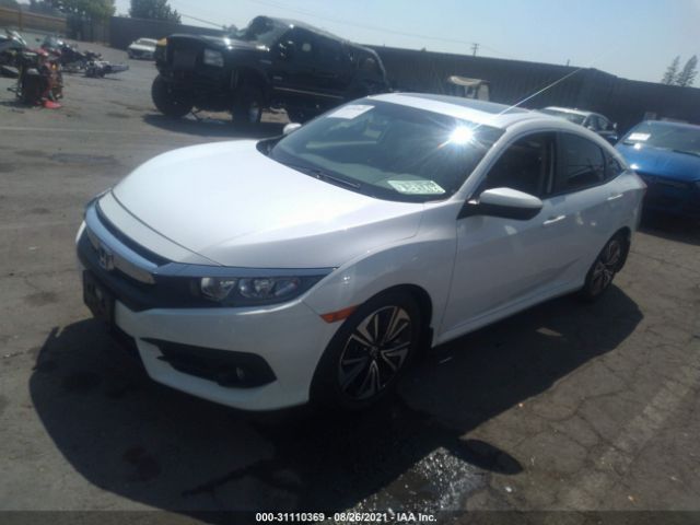 Photo 1 VIN: JHMFC1F78JX000279 - HONDA CIVIC SEDAN 