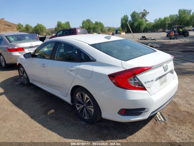 Photo 2 VIN: JHMFC1F78JX034979 - HONDA CIVIC 