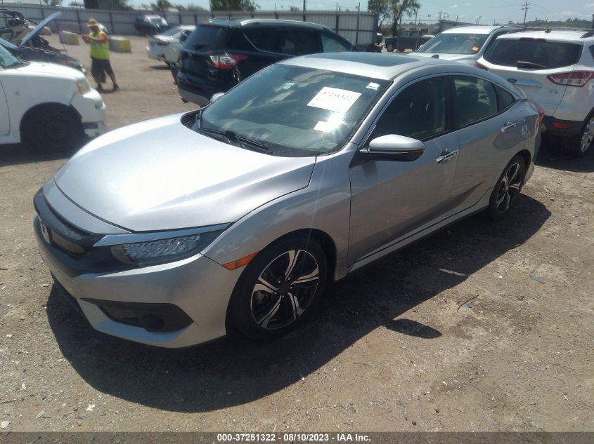 Photo 1 VIN: JHMFC1F90JX006756 - HONDA CIVIC 