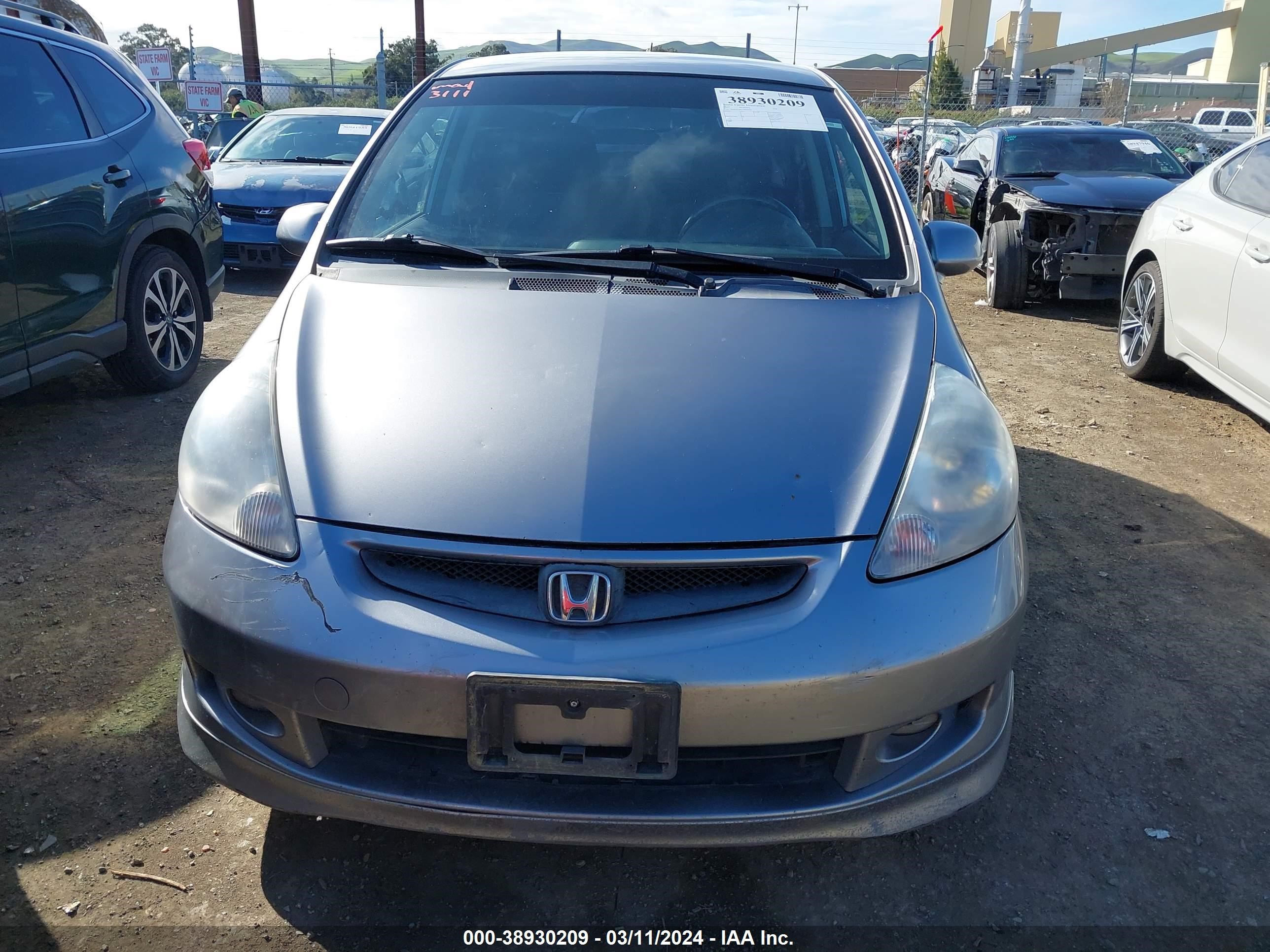 Photo 11 VIN: JHMGD38617S006092 - HONDA FIT 