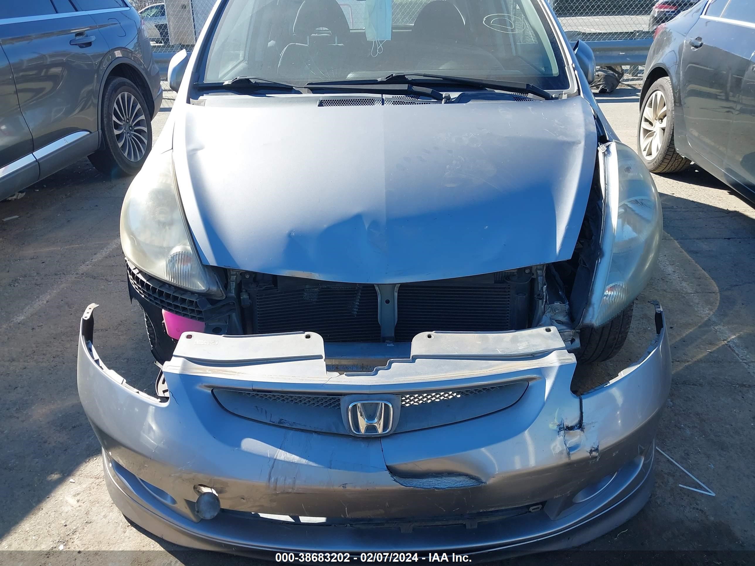 Photo 11 VIN: JHMGD38617S058029 - HONDA FIT 