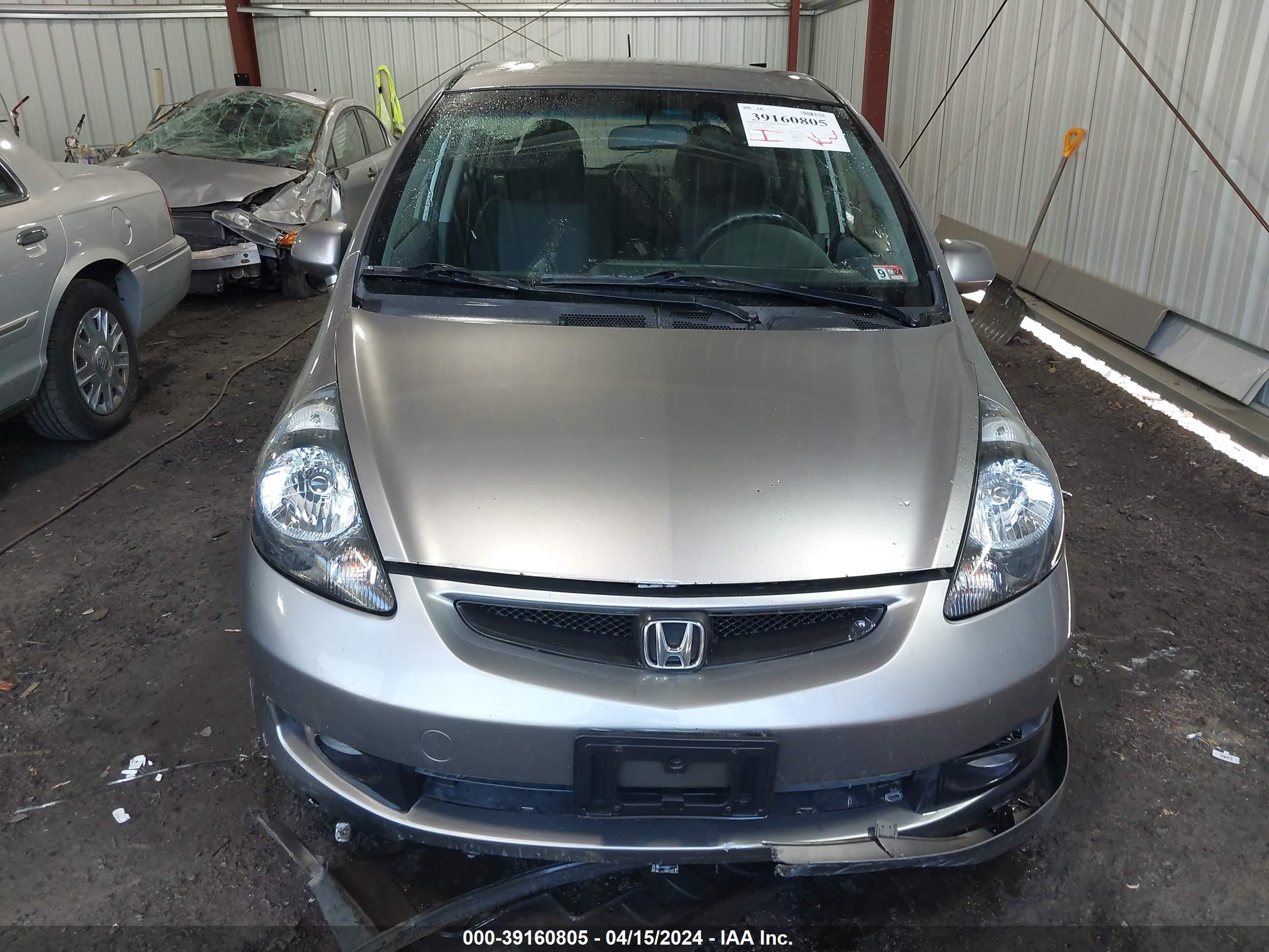 Photo 11 VIN: JHMGD38647S018933 - HONDA FIT 