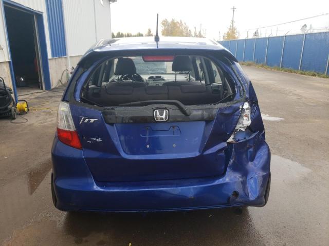 Photo 5 VIN: JHMGE88509S803230 - HONDA FIT LX 