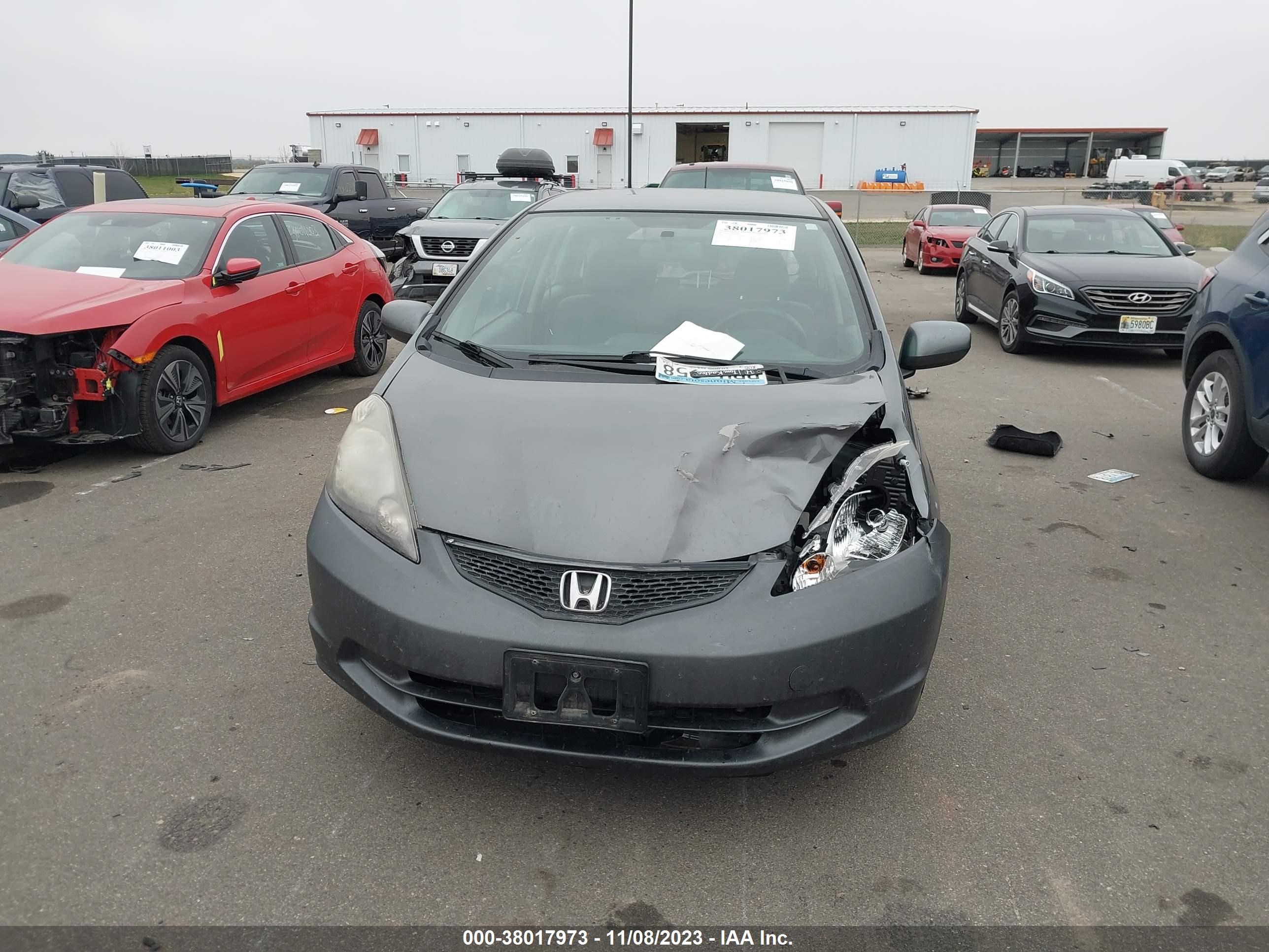 Photo 11 VIN: JHMGE8H32DC008584 - HONDA FIT 