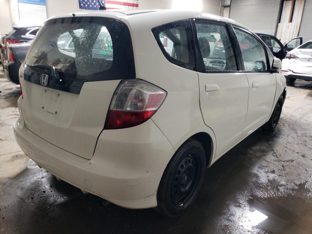 Photo 2 VIN: JHMGE8H34DC081245 - HONDA FIT 