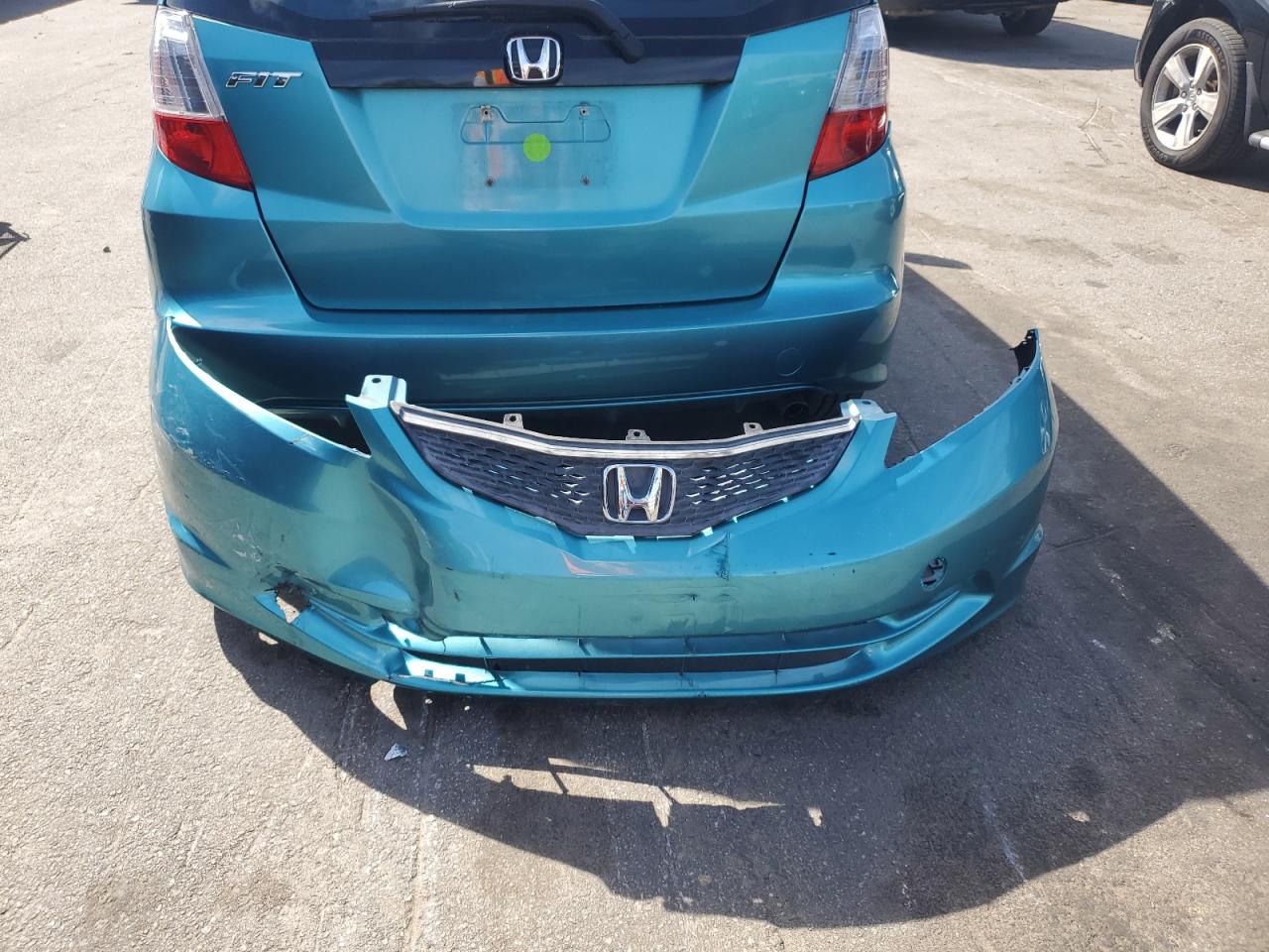 Photo 11 VIN: JHMGE8H38CC026599 - HONDA FIT 