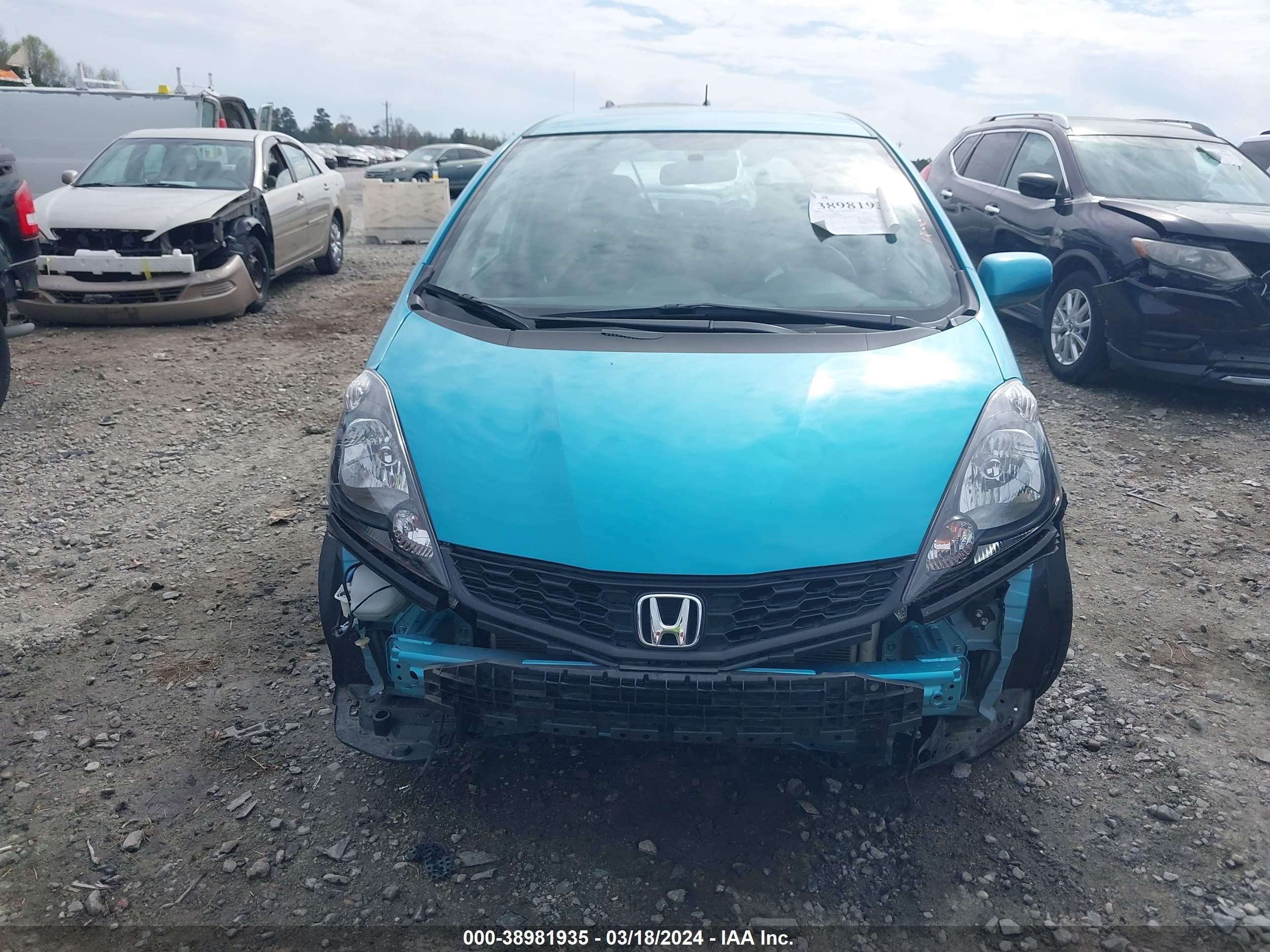 Photo 11 VIN: JHMGE8H55CC010989 - HONDA FIT 