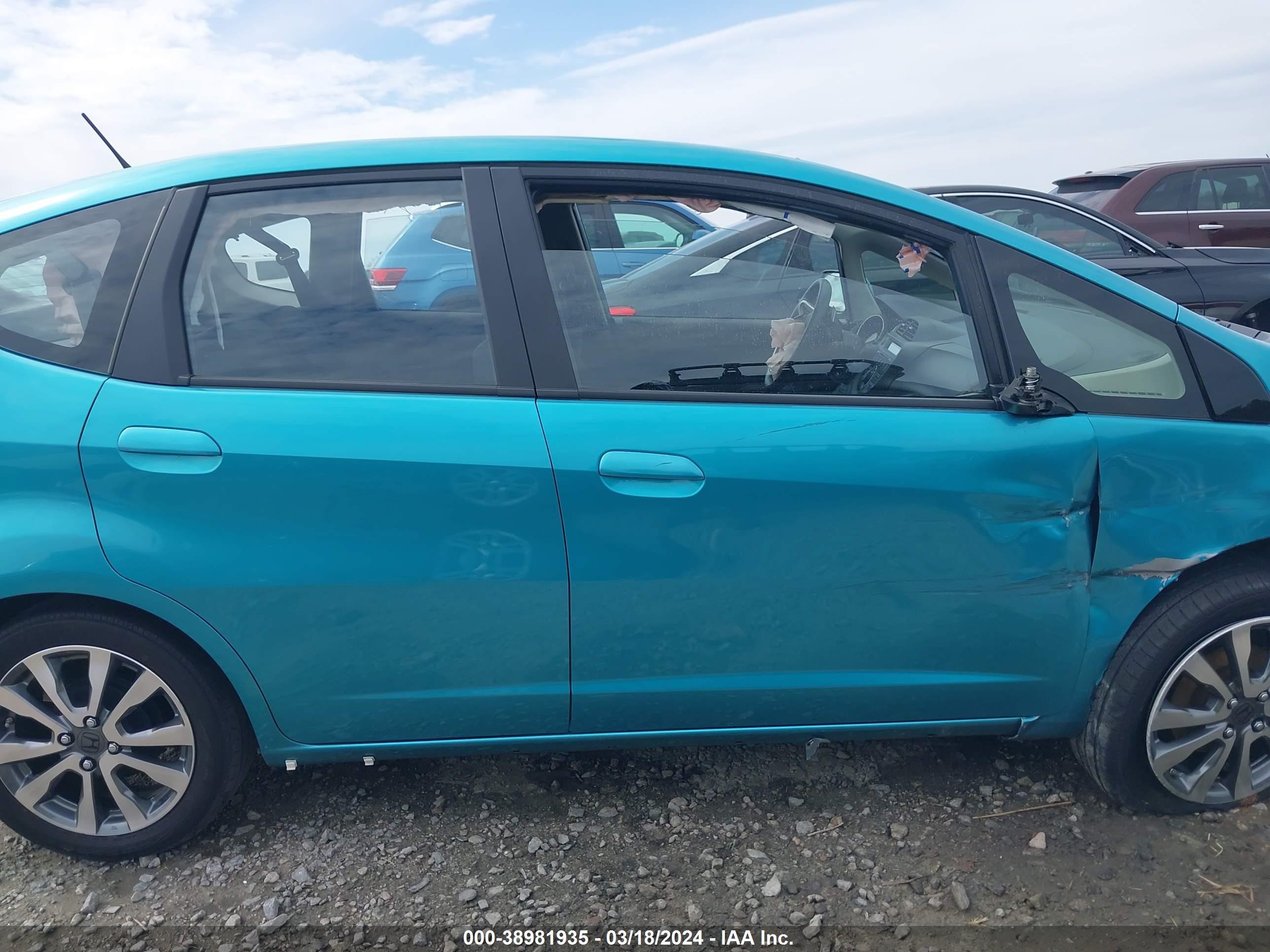 Photo 12 VIN: JHMGE8H55CC010989 - HONDA FIT 