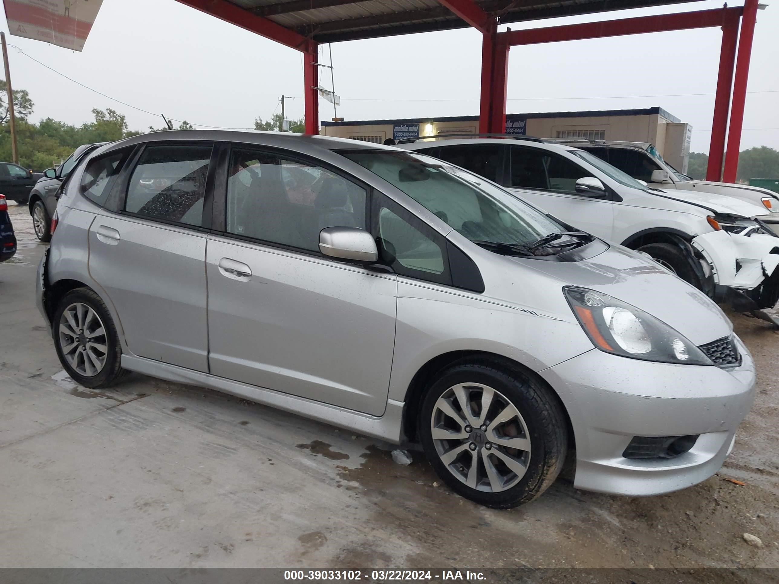 Photo 12 VIN: JHMGE8H5XCC024094 - HONDA FIT 