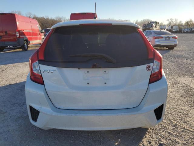 Photo 5 VIN: JHMGK5H50GS012927 - HONDA FIT LX 