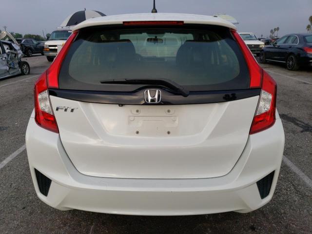 Photo 5 VIN: JHMGK5H50GS015584 - HONDA FIT LX 