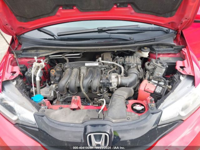 Photo 9 VIN: JHMGK5H50GX004832 - HONDA FIT 