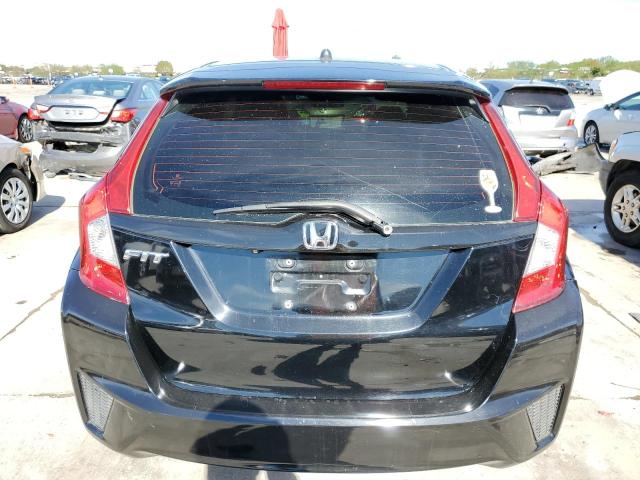 Photo 5 VIN: JHMGK5H50GX014017 - HONDA FIT LX 