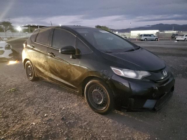 Photo 3 VIN: JHMGK5H50GX014311 - HONDA FIT LX 