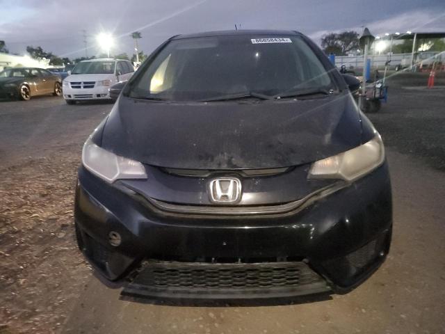 Photo 4 VIN: JHMGK5H50GX014311 - HONDA FIT LX 