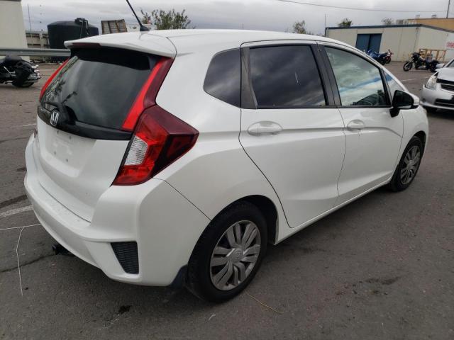 Photo 3 VIN: JHMGK5H50GX020979 - HONDA FIT LX 