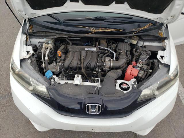 Photo 6 VIN: JHMGK5H50GX020979 - HONDA FIT LX 