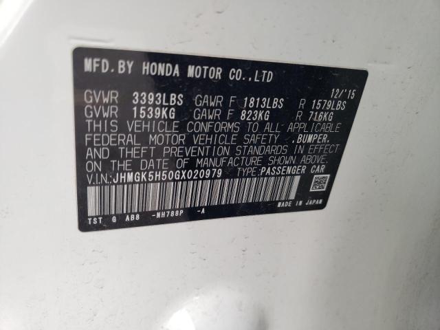 Photo 9 VIN: JHMGK5H50GX020979 - HONDA FIT LX 