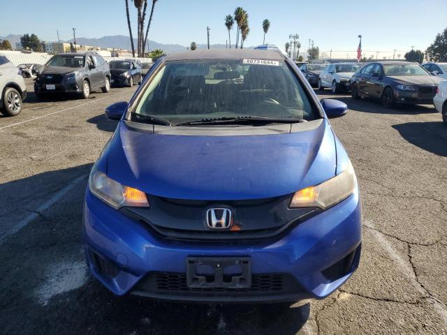 Photo 4 VIN: JHMGK5H50GX022165 - HONDA FIT LX 