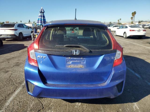 Photo 5 VIN: JHMGK5H50GX022165 - HONDA FIT LX 