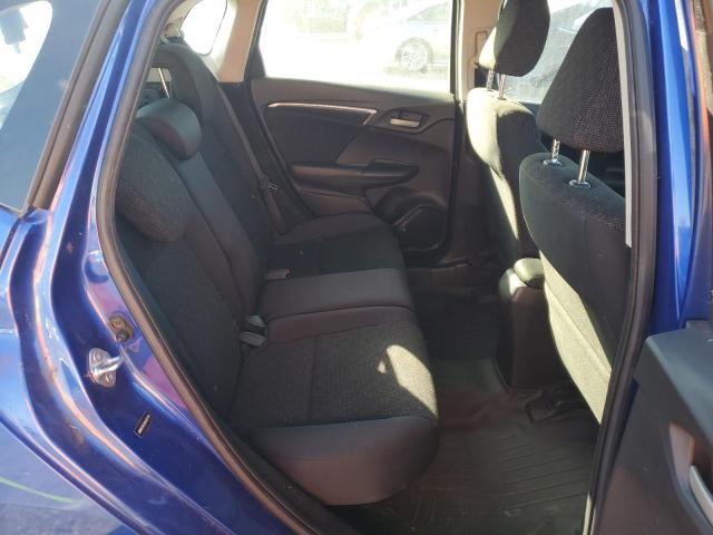 Photo 9 VIN: JHMGK5H50GX022165 - HONDA FIT LX 