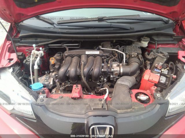 Photo 9 VIN: JHMGK5H50GX023722 - HONDA FIT 