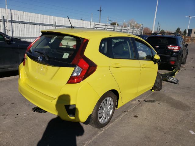 Photo 3 VIN: JHMGK5H50GX032338 - HONDA FIT LX 