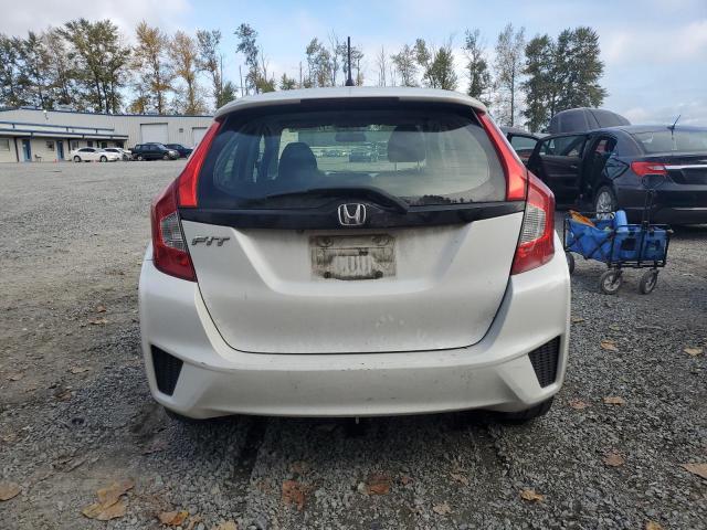 Photo 5 VIN: JHMGK5H50GX035305 - HONDA FIT LX 