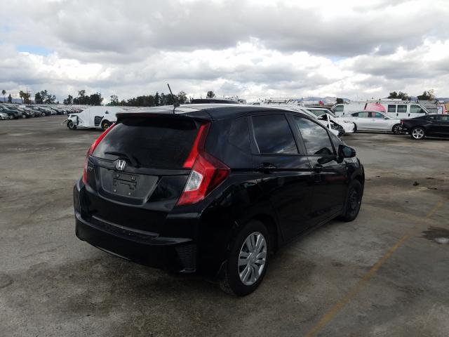 Photo 3 VIN: JHMGK5H51GS009275 - HONDA FIT LX 