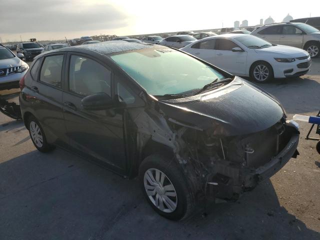 Photo 3 VIN: JHMGK5H51GX006816 - HONDA FIT LX 