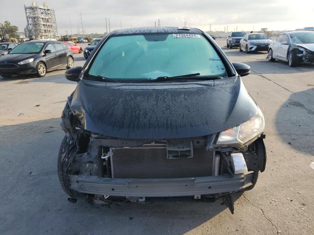 Photo 4 VIN: JHMGK5H51GX006816 - HONDA FIT LX 