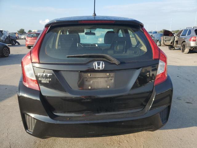 Photo 5 VIN: JHMGK5H51GX006816 - HONDA FIT LX 