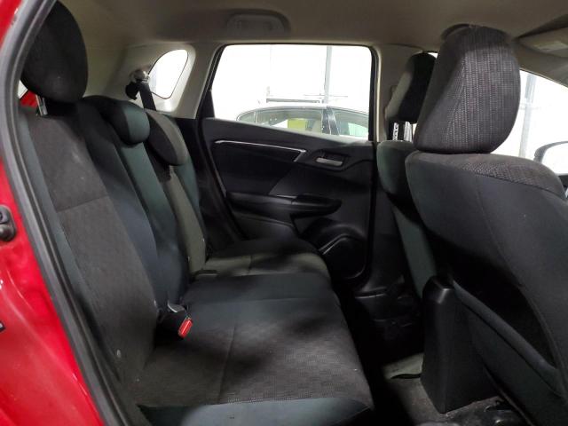 Photo 10 VIN: JHMGK5H51GX007559 - HONDA FIT LX 