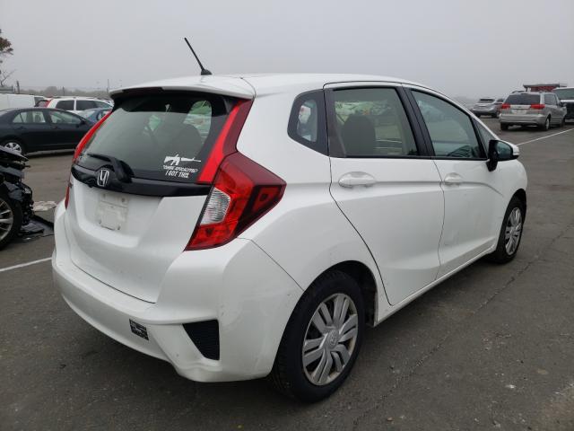 Photo 3 VIN: JHMGK5H51GX009487 - HONDA FIT LX 