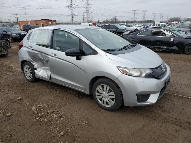 Photo 3 VIN: JHMGK5H51GX009909 - HONDA FIT LX 