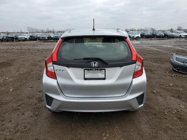 Photo 5 VIN: JHMGK5H51GX009909 - HONDA FIT LX 