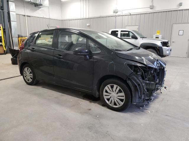 Photo 3 VIN: JHMGK5H51GX014303 - HONDA FIT LX 