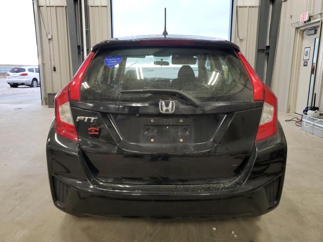 Photo 5 VIN: JHMGK5H51GX014303 - HONDA FIT LX 