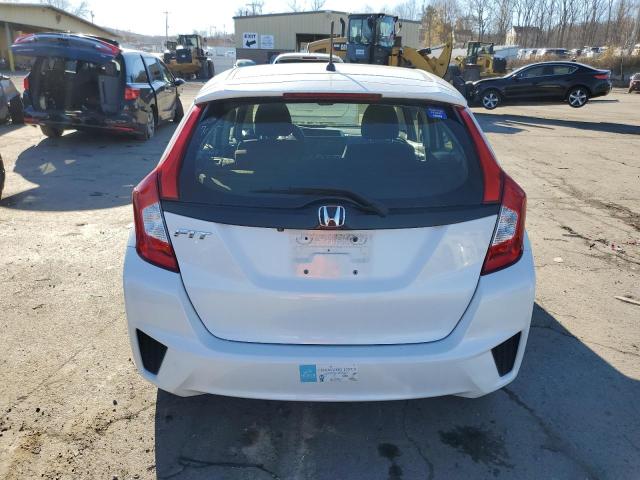 Photo 5 VIN: JHMGK5H51GX026886 - HONDA FIT LX 